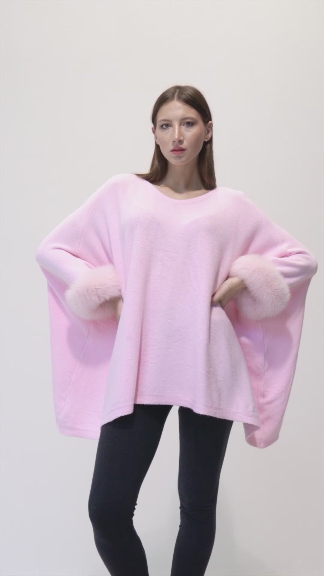 London - Pink poncho with fur on the cuffs